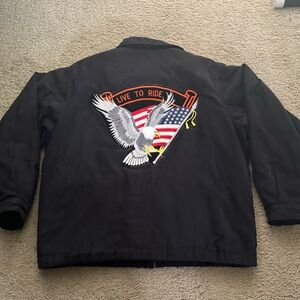 Men’s Van Heusen black fleece/quilted jacket on back sewn “Live to Ride” patch